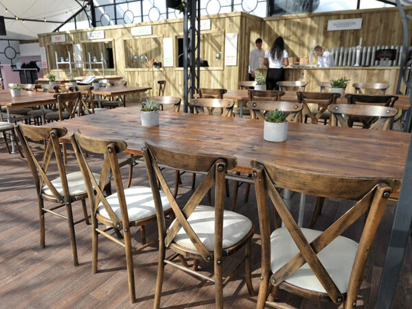 Scaffold dining tables offer a rustic yet modern look